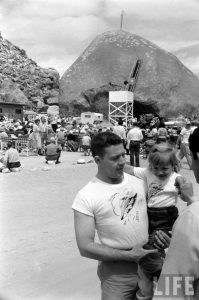 Shirt vendor and child at 1950s UFO convention